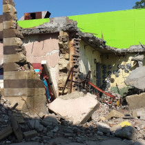 Destroyed Caïro set. Sculpted in styro covered with hard plaster or cement. Stones, bricks, cement blocks, cement roof slabs has been produced and installed by sculptors-plasterers team.