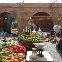 Falafel Market Street. Varied wall textures from styro stone covered with cement, casted stone works, worn crepi