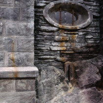 Dongeon set - Two types of plaster stone panels. We made the models, molded, casted and installed the stone panels. Sculpted windows and rocks