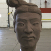 13 head models sculpted in clay, casted in plaster, assembled according to their position in the army distinguished by the headgears.