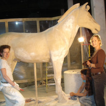 Here we are sculpting the the larger size horse which will accompany Jet Lee's sculpture on the Chariot. Four (4) of this type were made. Sculptors: Lucie Fournier, Chantal Deshaies and Linda Bicari. Sculpture in styro, finition in plaster, molded and casted in plaster