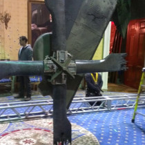 OVAL OFFICE / HELICOPTER CRASH -  Sculpted helicopter tail. Fiber glass, plastic and rigid urethane. Note1: Mechanical and robotics effects are made by specialized team under the leadership of Cameron Waldbauer. Note2: We also had to mold and cast varied objects in the purpose of ultimate destruction by bullets impacts effects done by Terry Glass team. Vases, plates, glasses, bowls, lamps, even a clock, chandeliers, porcelain sinks, columns, busts all specialy casted to break without injure.